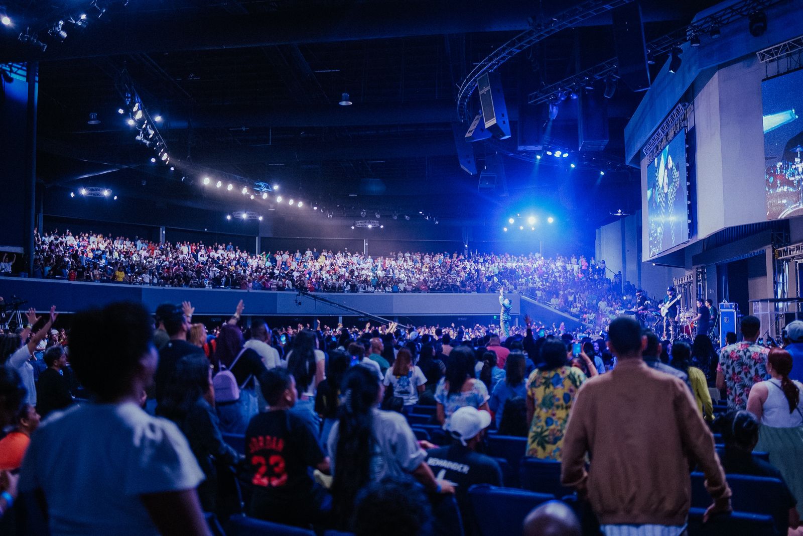 Audience filling a large performing-arts venue during an event.